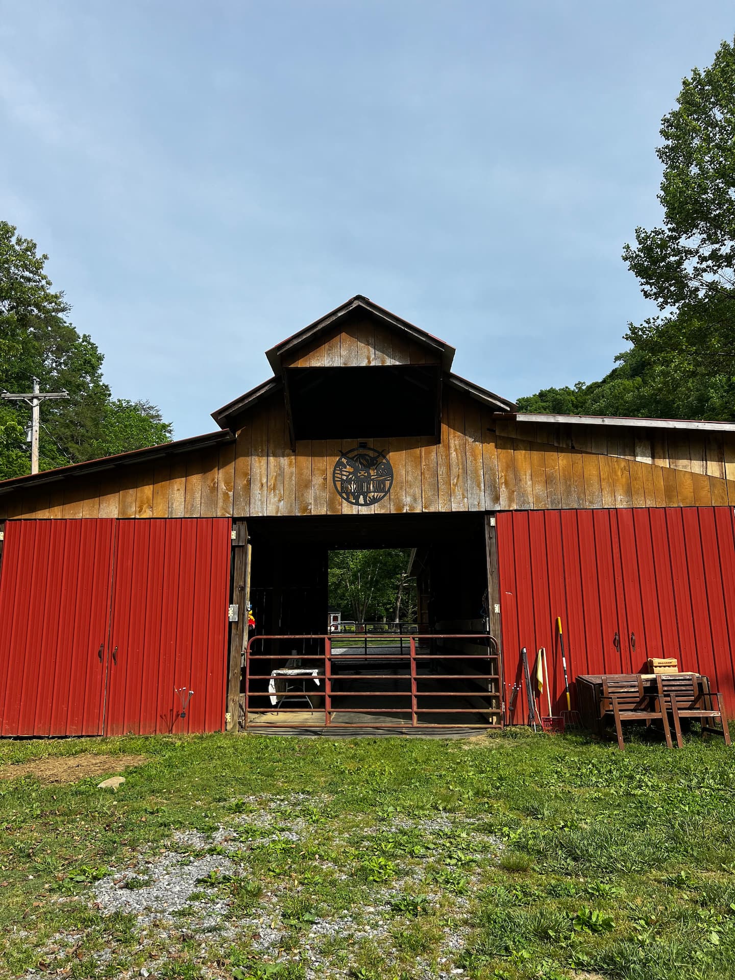 The red barn at God's Country Ranch, a Highland cattle farm stay in Walland, Tennessee